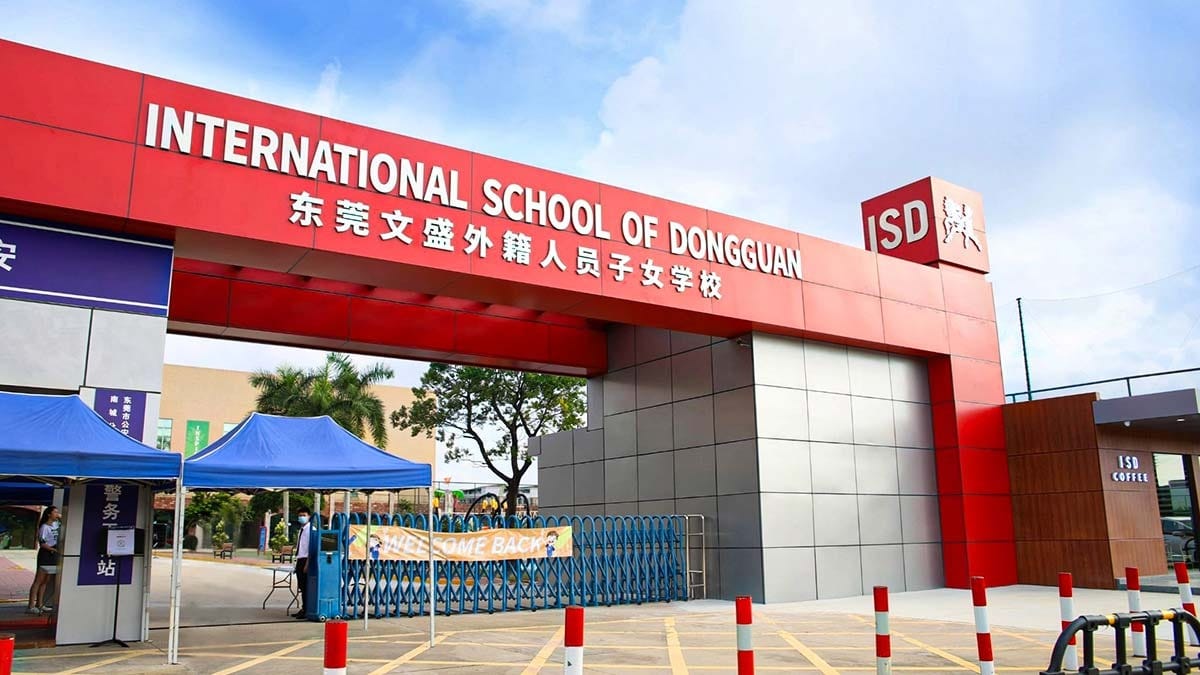 International School of Dongguan main entrance with red signage and ISD branding