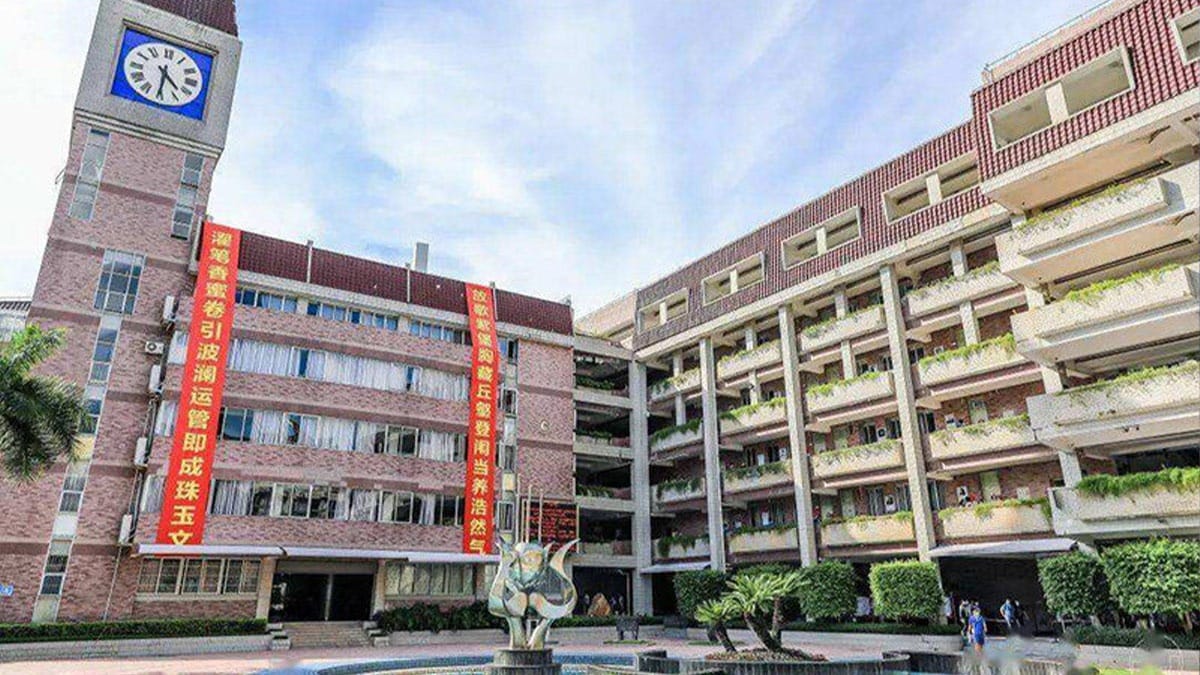 Shenzhen Senior High School International Division clock tower and courtyard with red banners