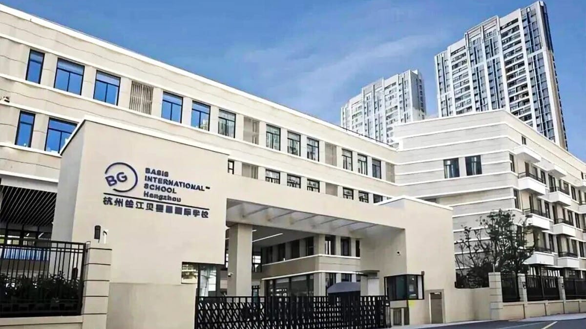 BASIS International School Hangzhou campus entrance with modern white building facade