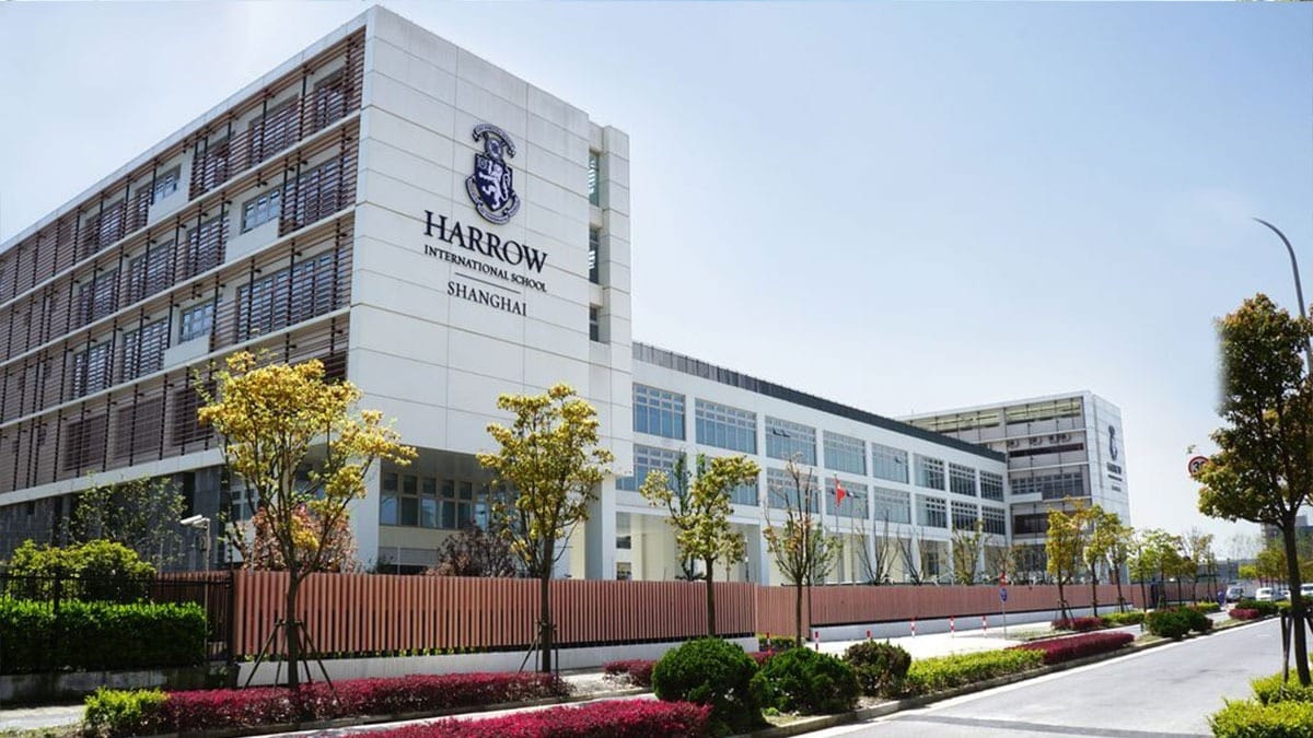 Harrow International School Shanghai modern campus building with crest and landscaping