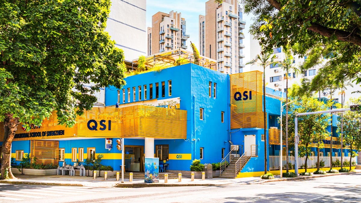 QSI International School of Shenzhen vibrant blue and yellow building exterior