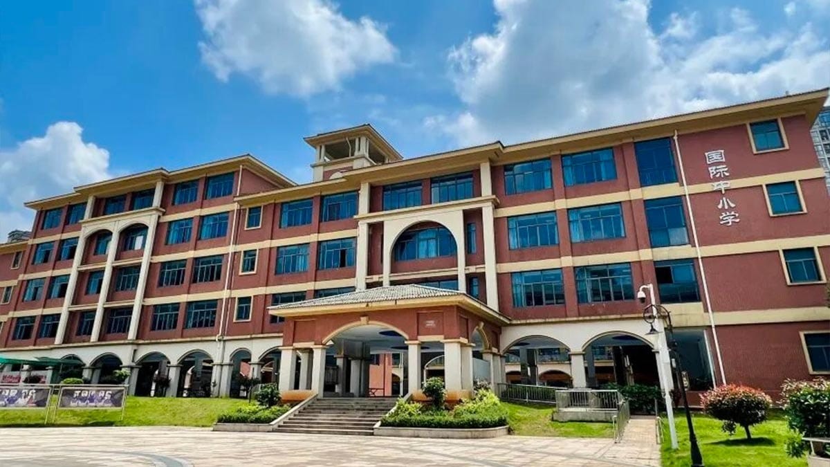 Ningxiang Country Garden School pink and beige campus building with arched entrance