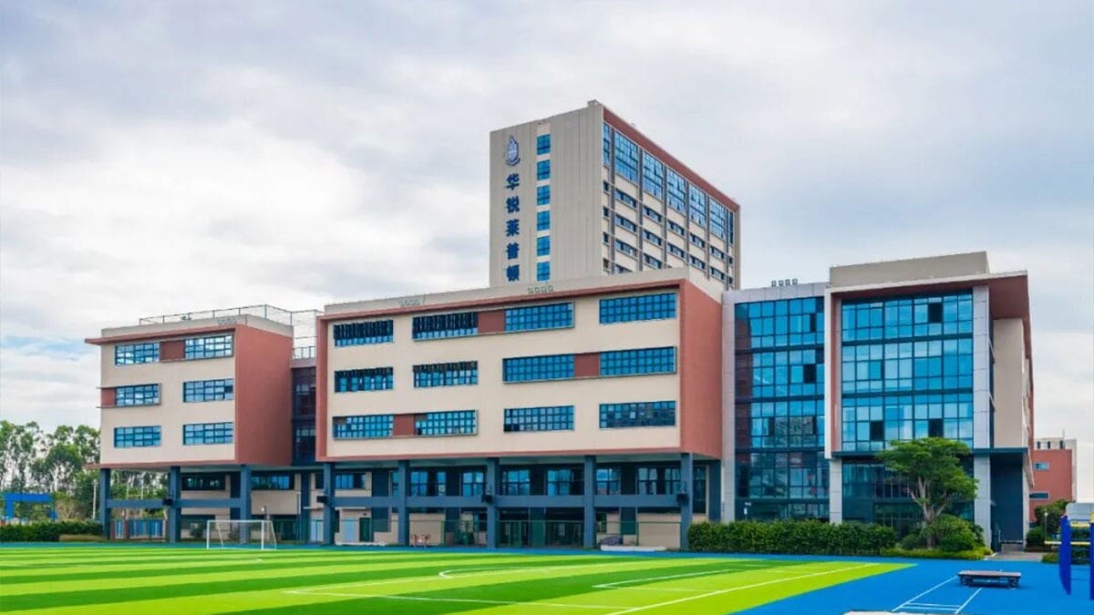 Chiway Bilingual School Xiamen modern campus with athletic field and facilities