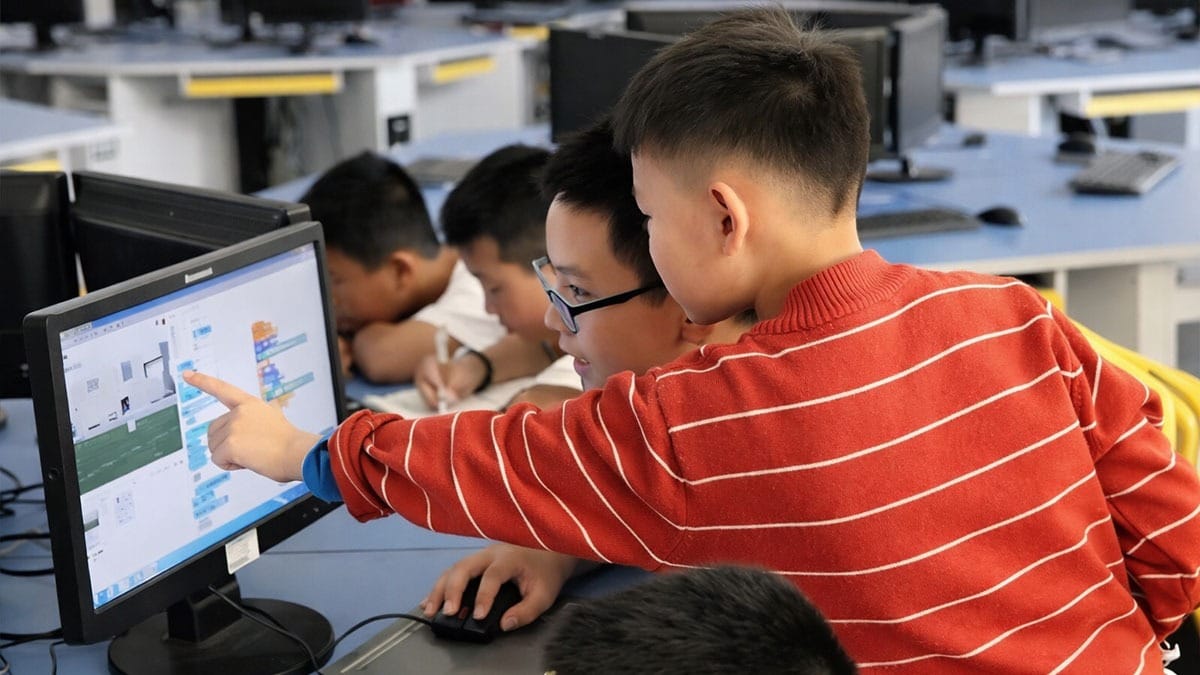 STEAM Education students in China coding on computers in a K12 classroom