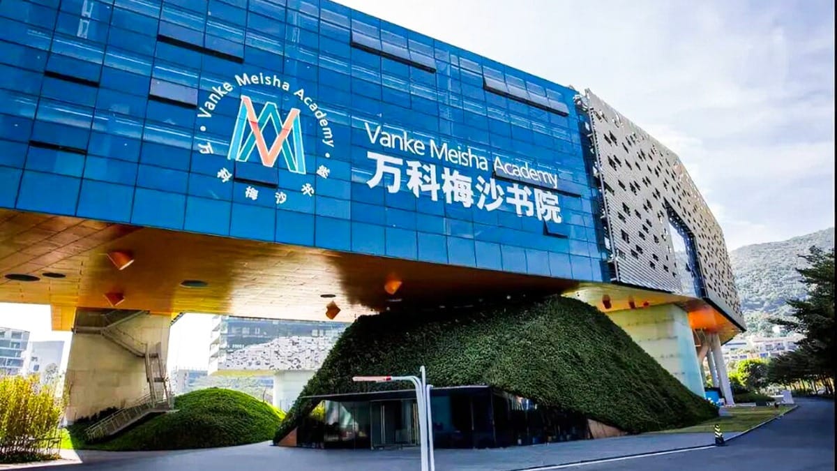 Vanke Meisha Academy modern campus building with green landscaping in Shenzhen