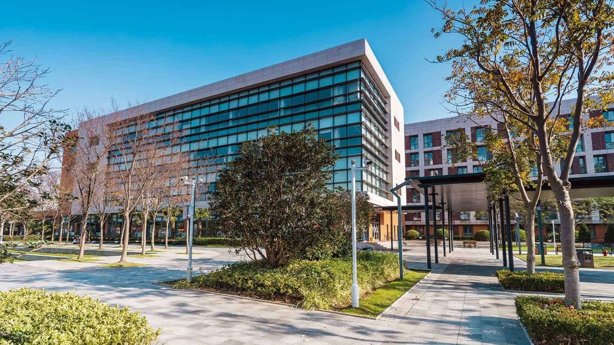 Yew Wah International Education School Shanghai Lingang glass building and landscaped grounds