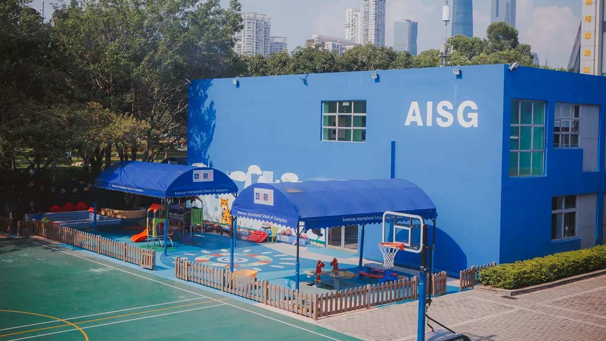 American International School of Guangzhou (AISG) blue building with playground