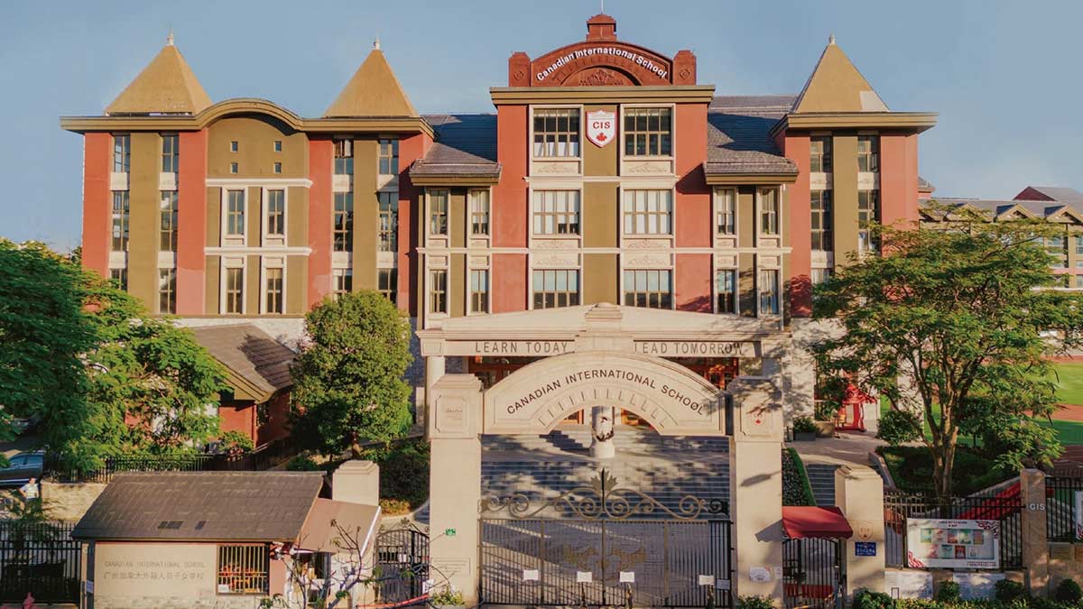 Canadian International School Guangzhou ornate red brick building and arched gate