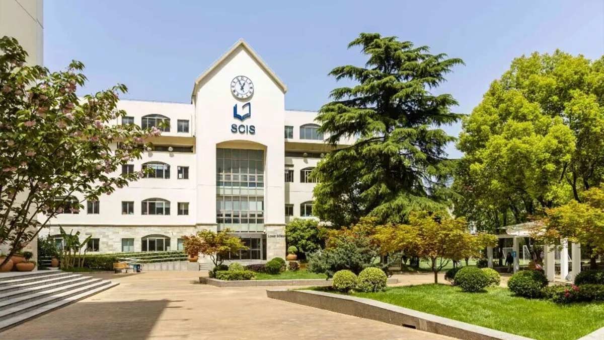 Shanghai Community International School SCIS white main building with clock tower