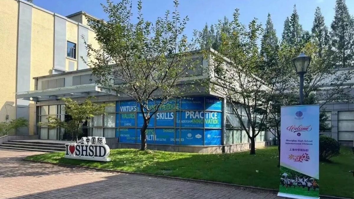 Shanghai High School International Division campus entrance with I Love SHSID sign