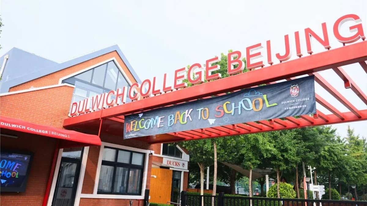 Dulwich College Beijing entrance gate with Welcome Back to School banner