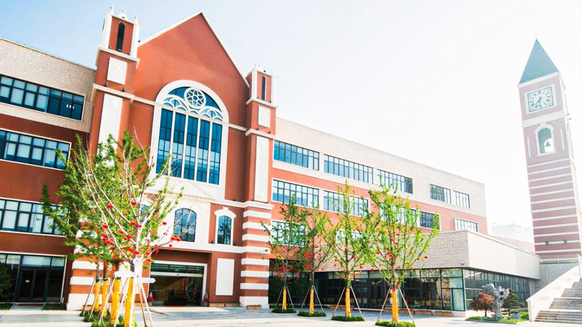 Dulwich College Suzhou main building with arched windows and clock tower