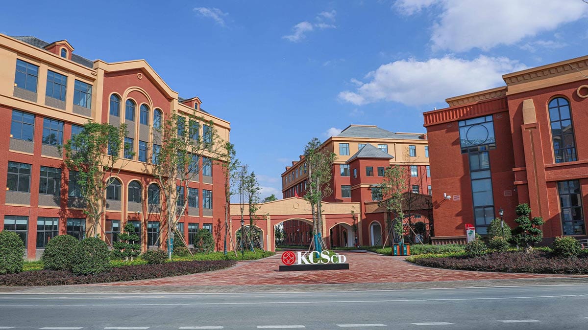 Dipont KCS Chengdu European-style red brick campus exterior with arched gateway