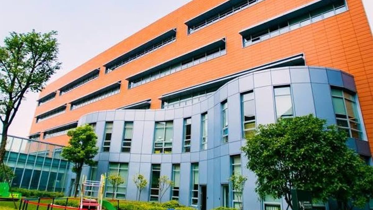Wuhan Yangtze International School orange brick campus building and playground