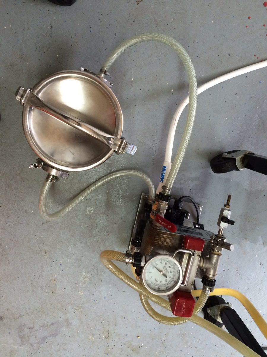 From pump to the upper inlet, from the lower outlet to the plate chiller and valve.