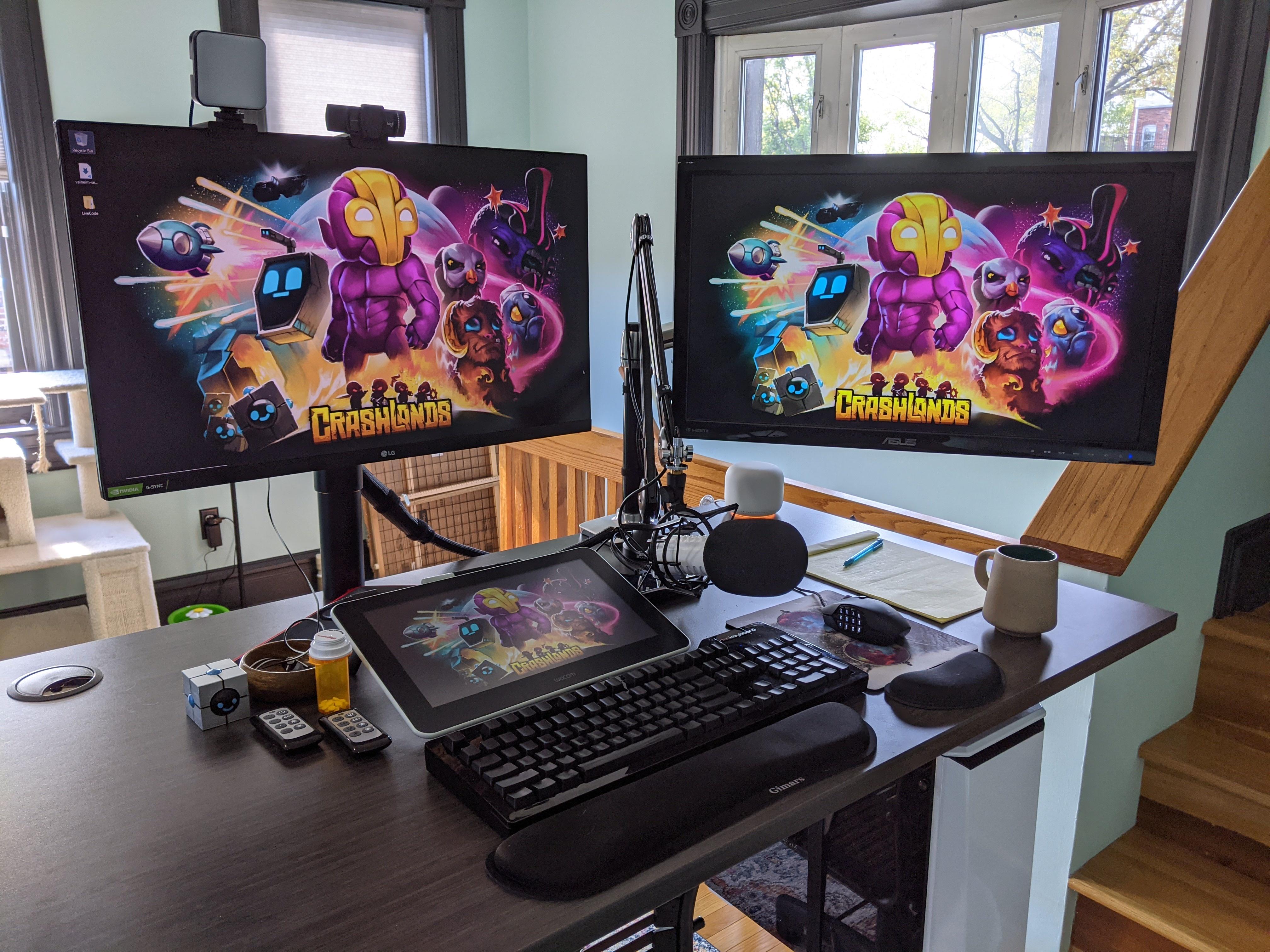 Multi-monitor desktop PC workstation setup.
