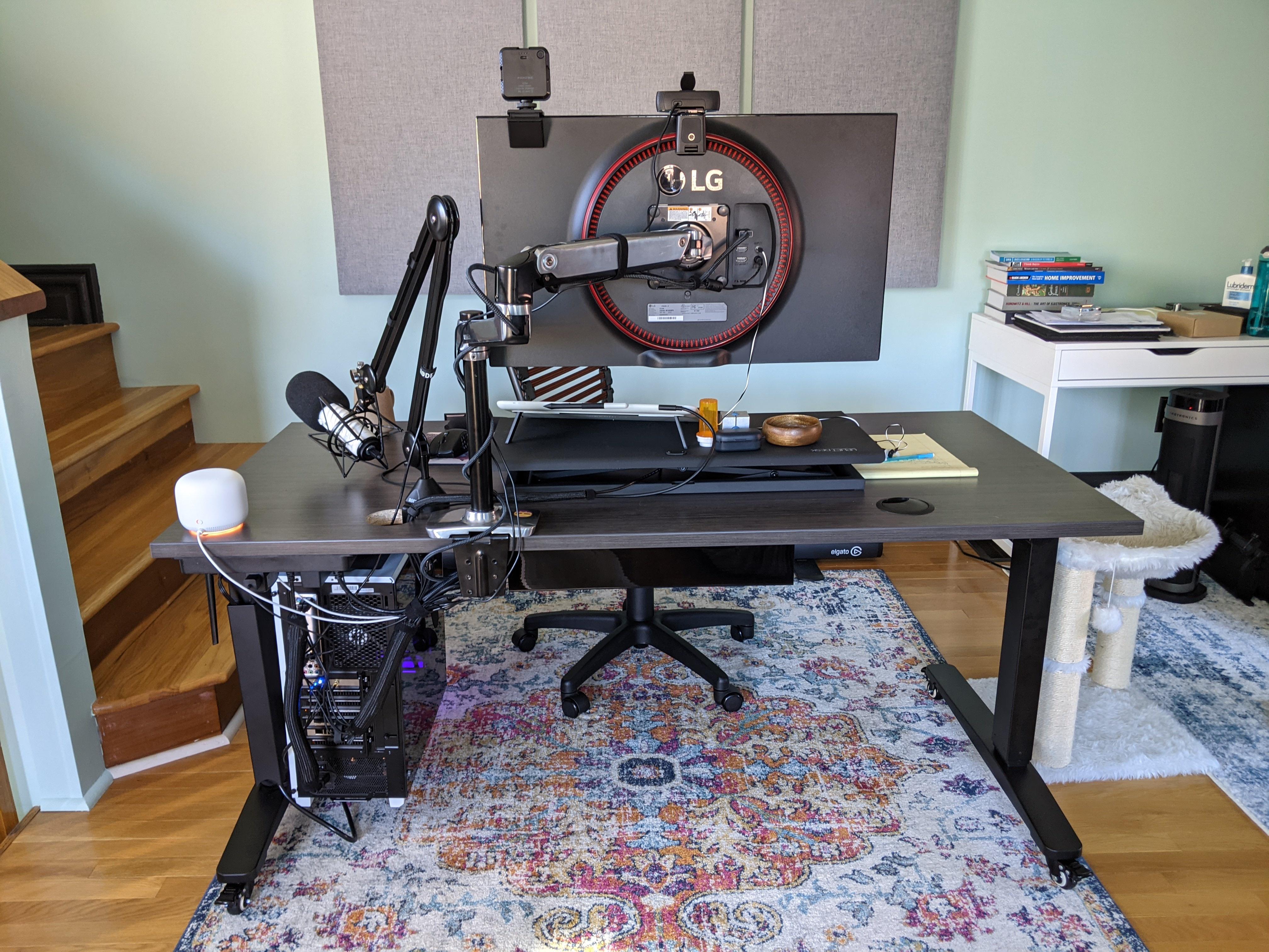 New Uplift desk setup from behind, showing cable management.