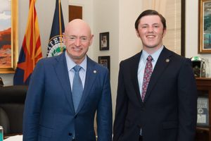 Jackson James and Mark Kelly standing together in an office.