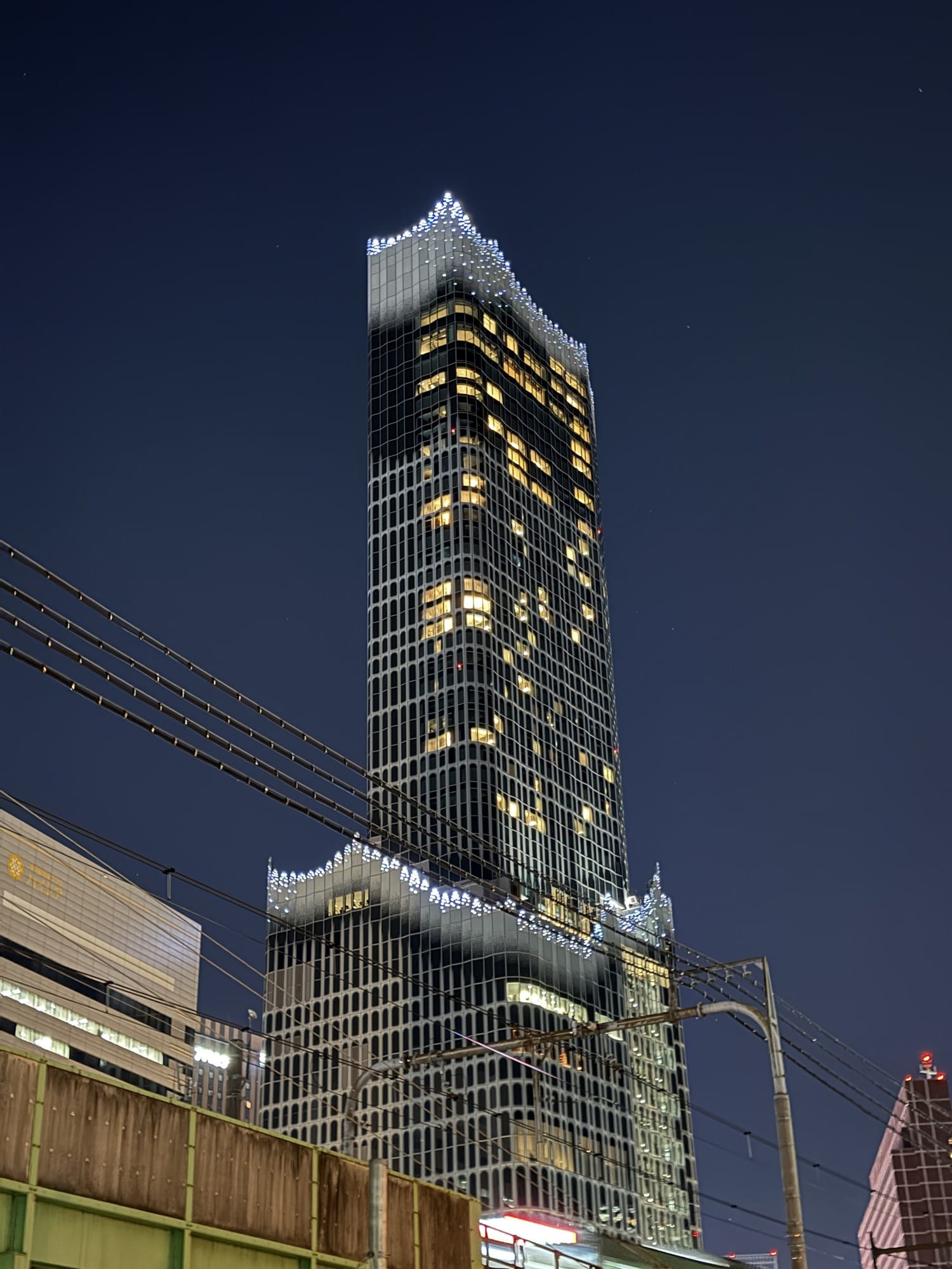 Tokyu Kabukicho Tower lit at night in Shinjuku