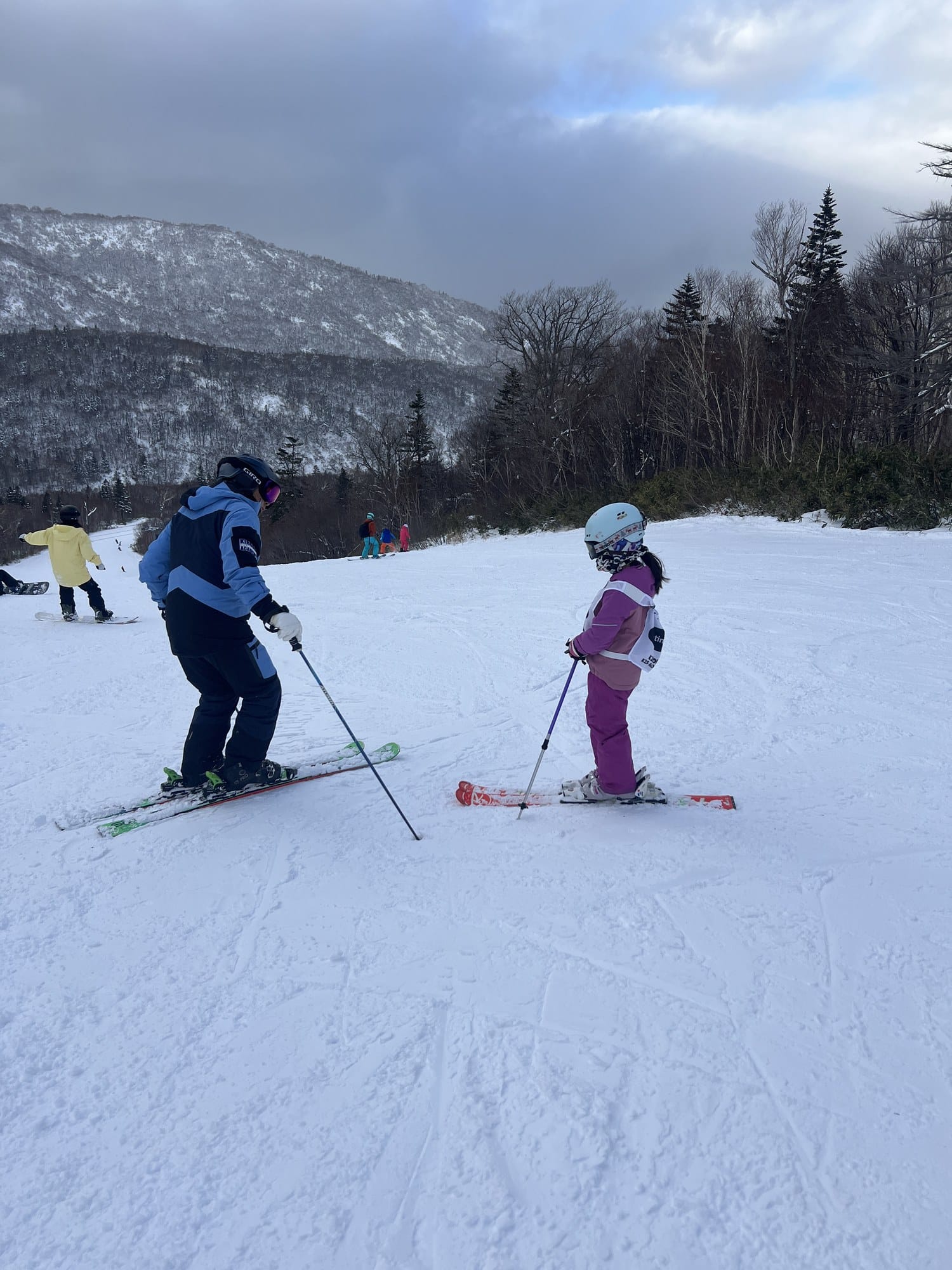 Instructor and young skier during a lesson at Kiroro