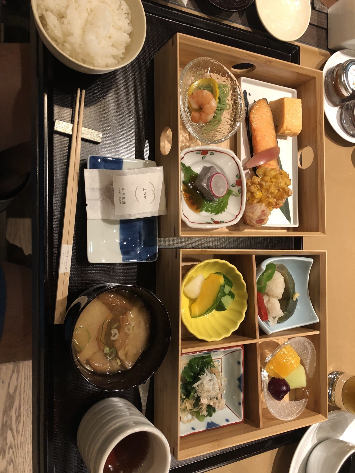 A Japanese breakfast set served in cedar boxes at HOTEL THE MITSUI KYOTO