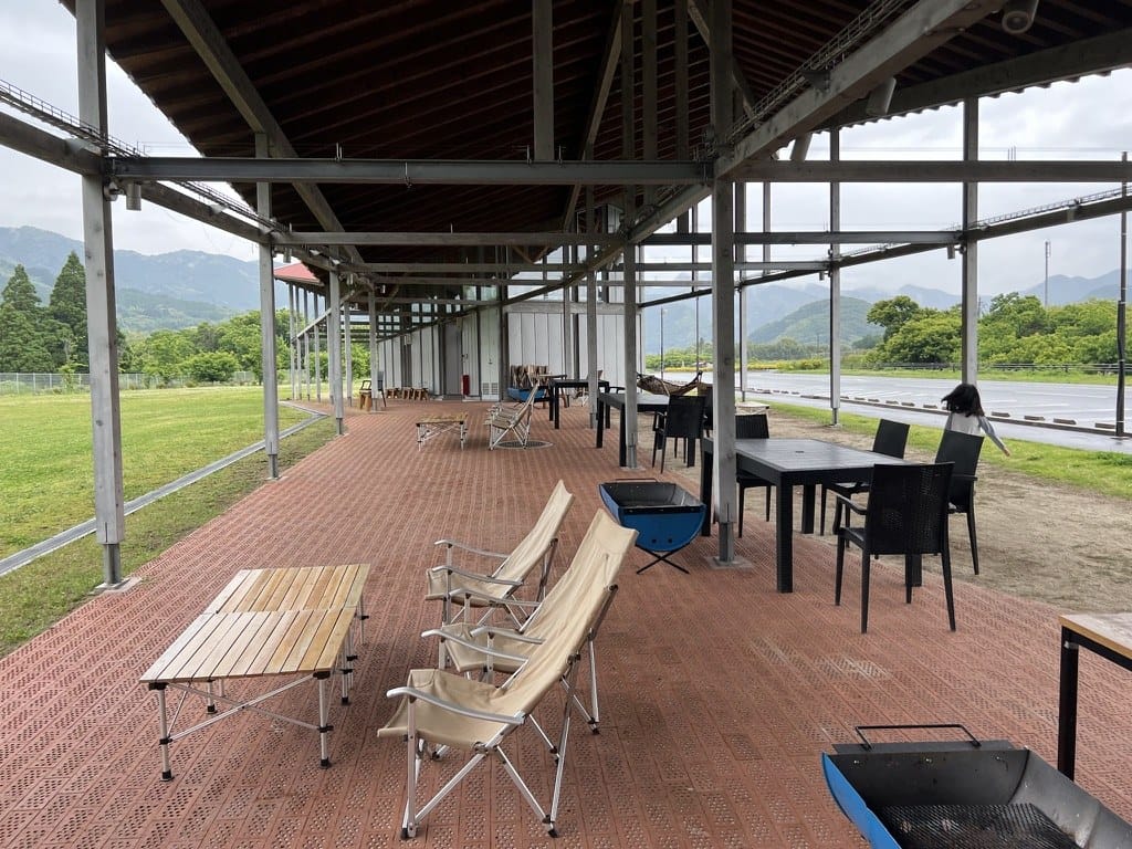 Covered terrace with tables at the Kikuka winery in northern Kumamoto