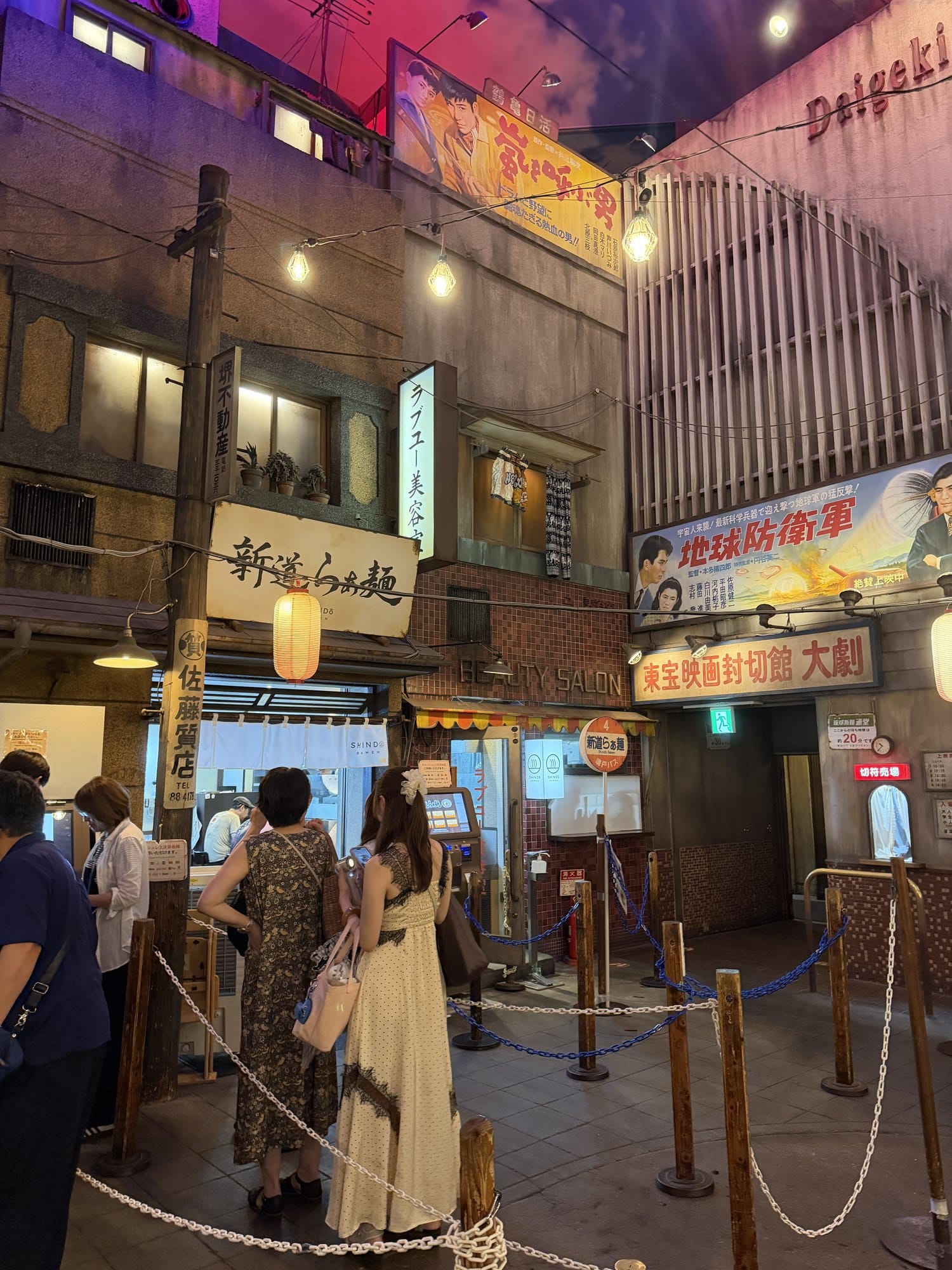 Replica 1958 Tokyo street inside the Shin-Yokohama Ramen Museum, with painted film hoardings and hanging lanterns