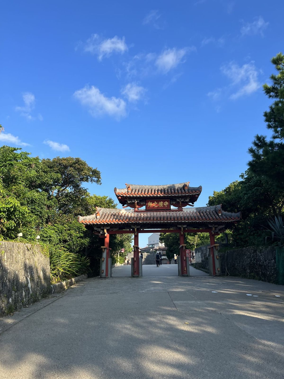 Shuri-style gate in Naha Okinawa under a blue sky