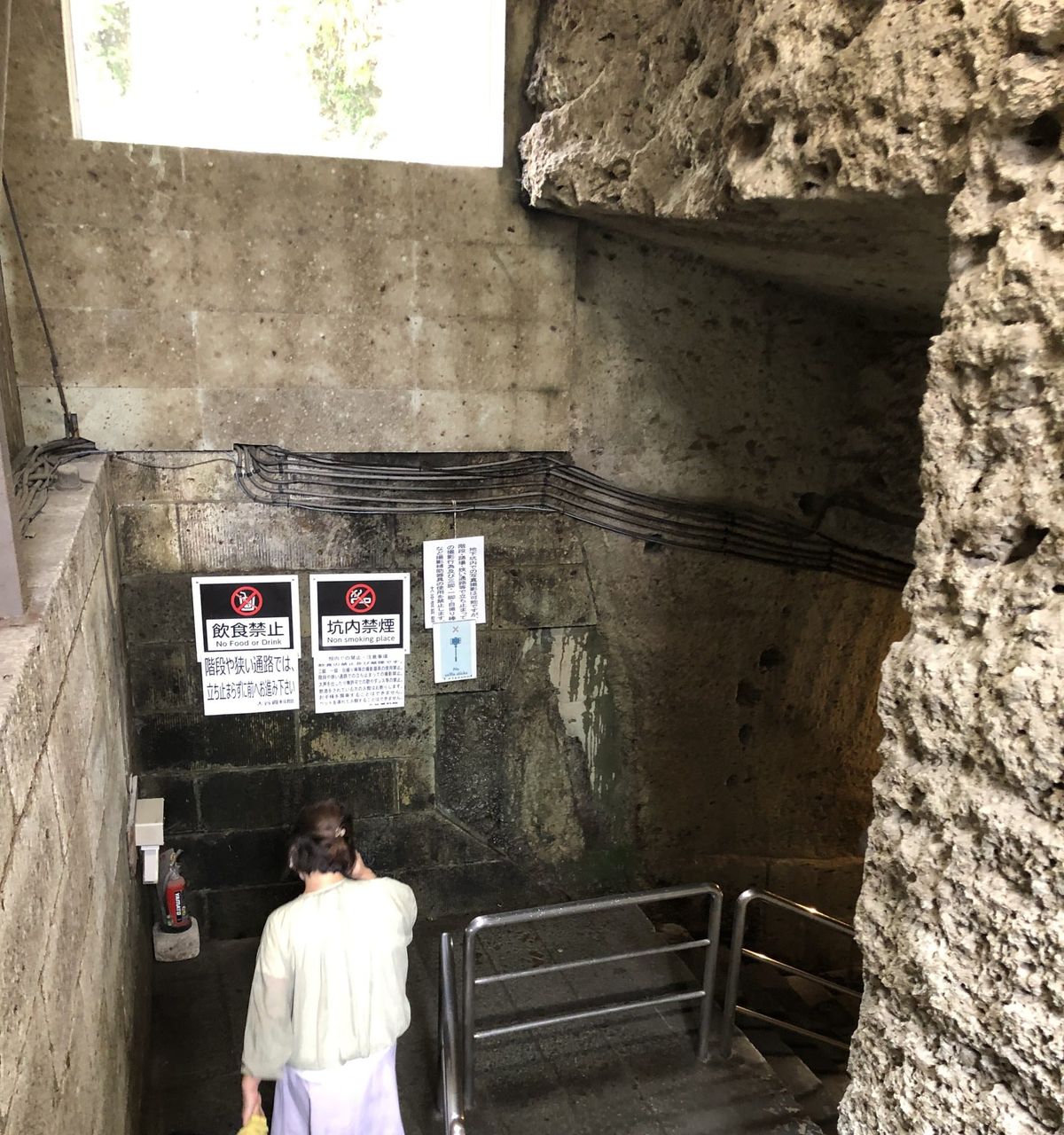 Stairway descending into the underground quarry at the Oya History Museum