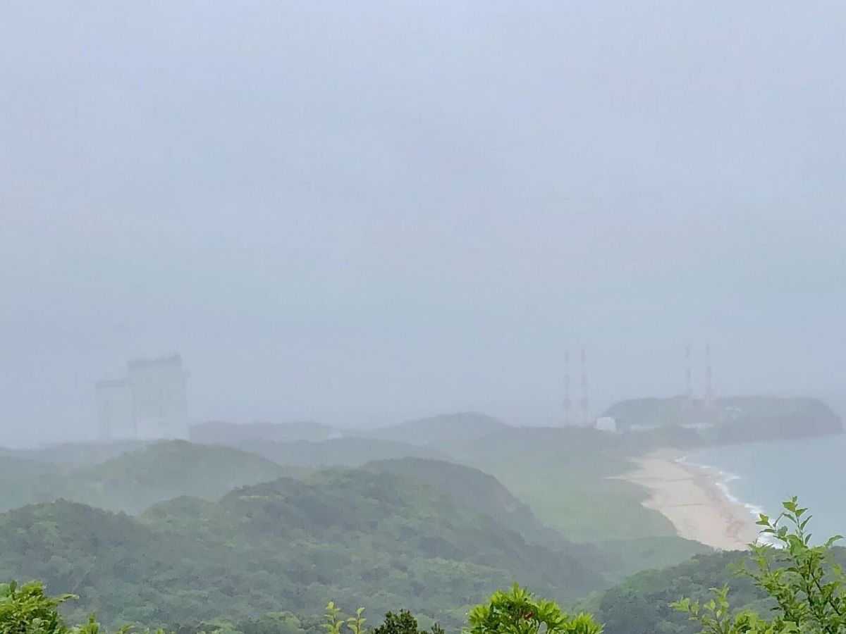 Tanegashima Space Center launch complex and coastline seen from a viewpoint in heavy fog