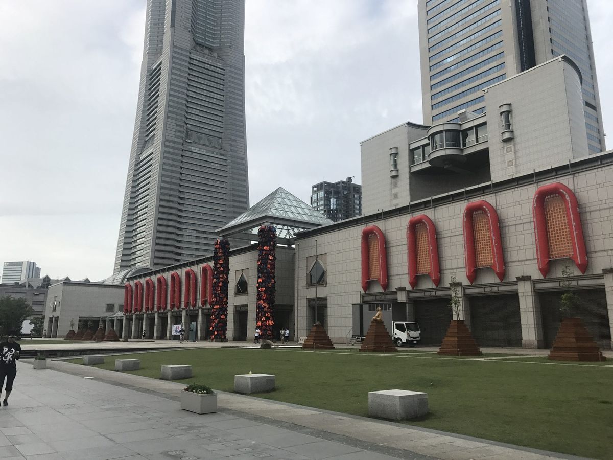 Yokohama Landmark Tower and the Minato Mirai cultural precinct with a large outdoor art installation on the museum plaza