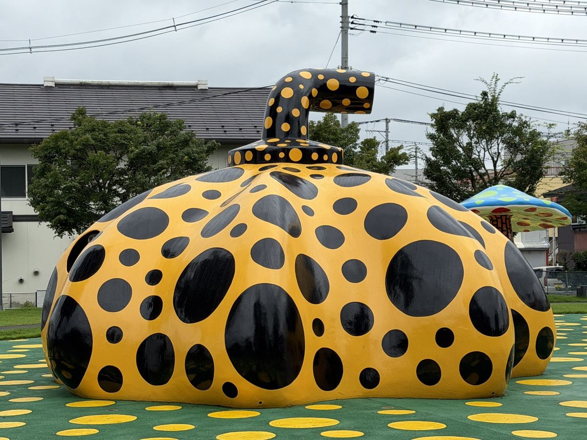 Yayoi Kusama's yellow polka-dot pumpkin in the Art Square at Towada Art Center, Aomori