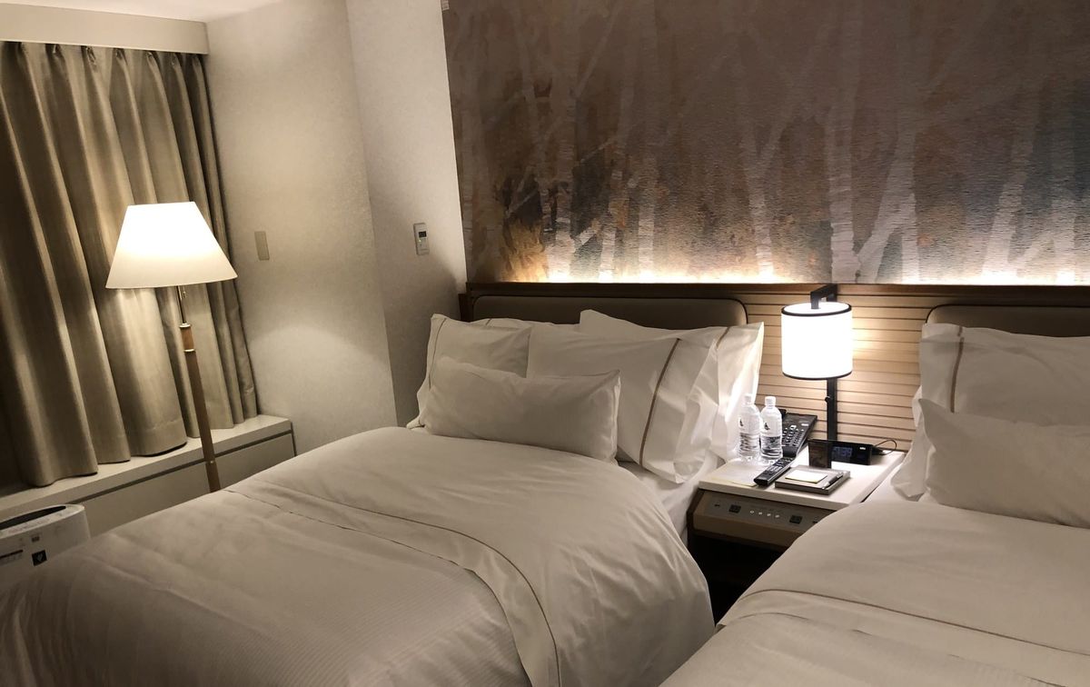 Twin beds in a room at the Westin Rusutsu Resort