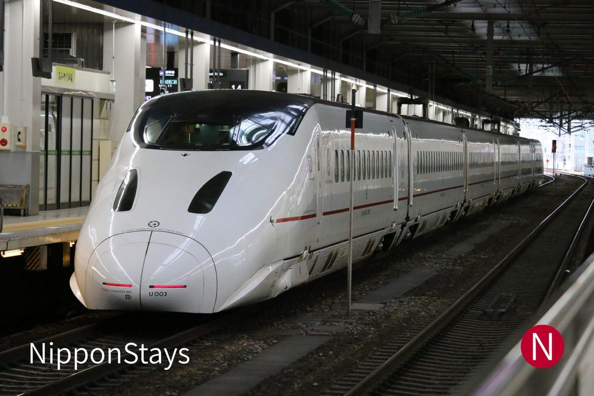 A Kyushu Shinkansen train waiting at the platform
