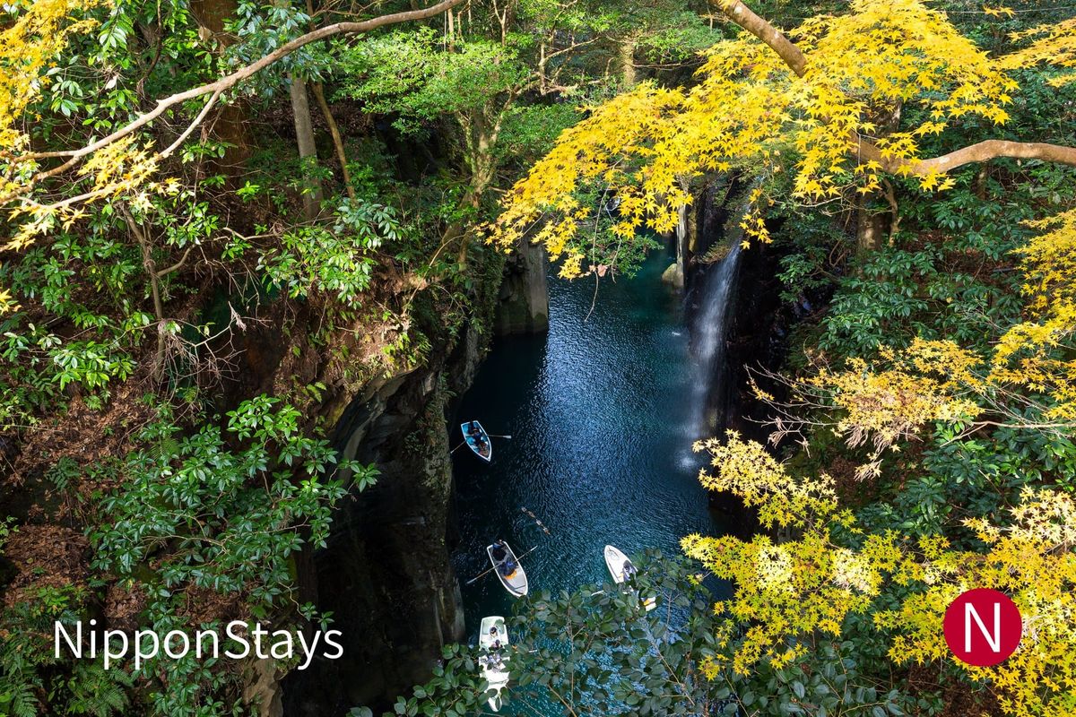The cliffs and green water of Takachiho Gorge