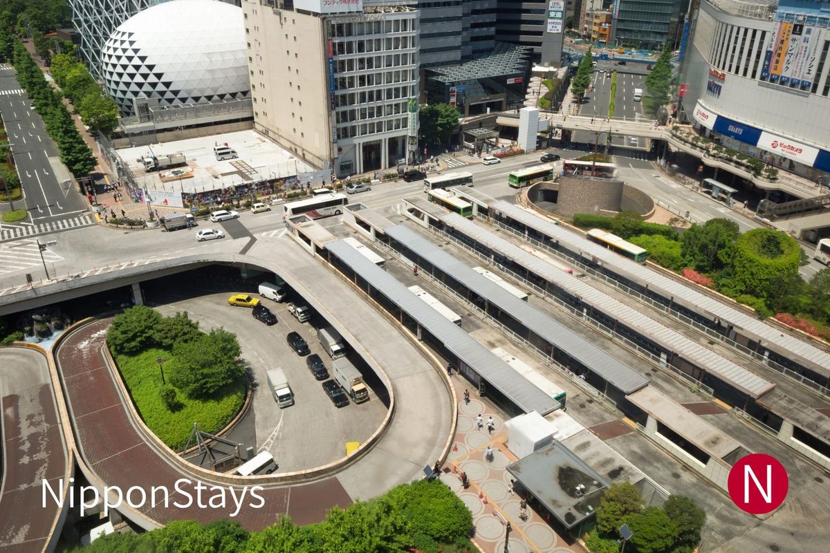 Aerial view of the bus and taxi rotary outside Shinjuku Station