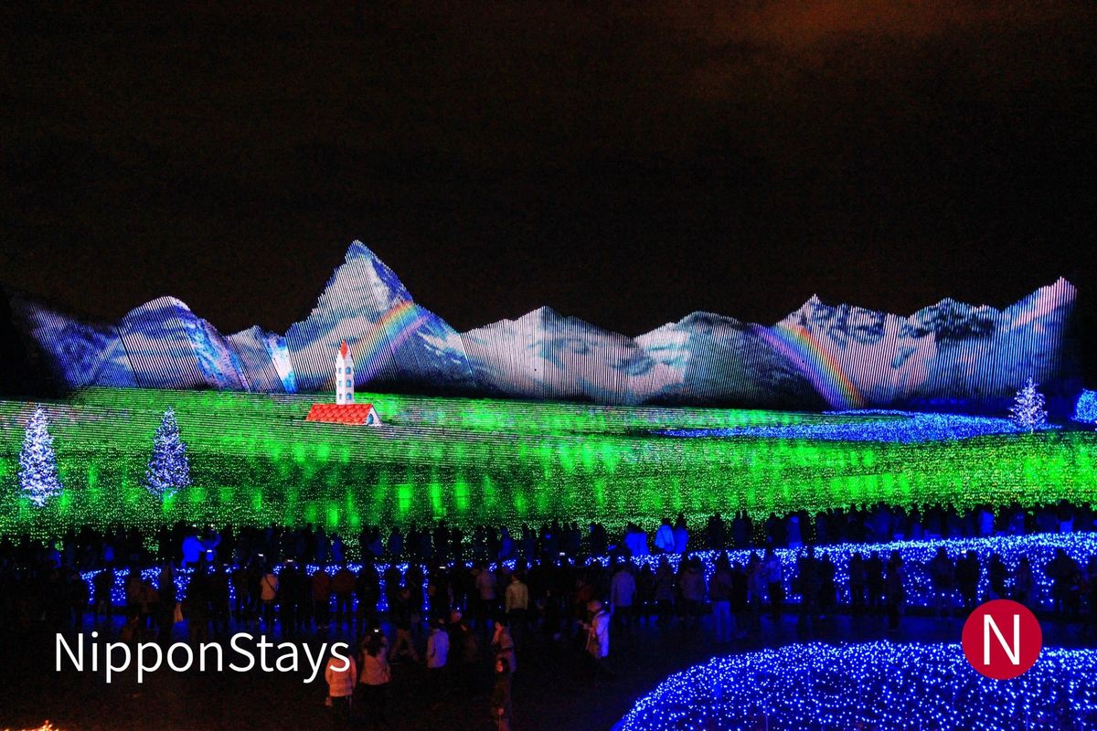 The Nabana no Sato winter illumination lighting a mountain scene in blue and green