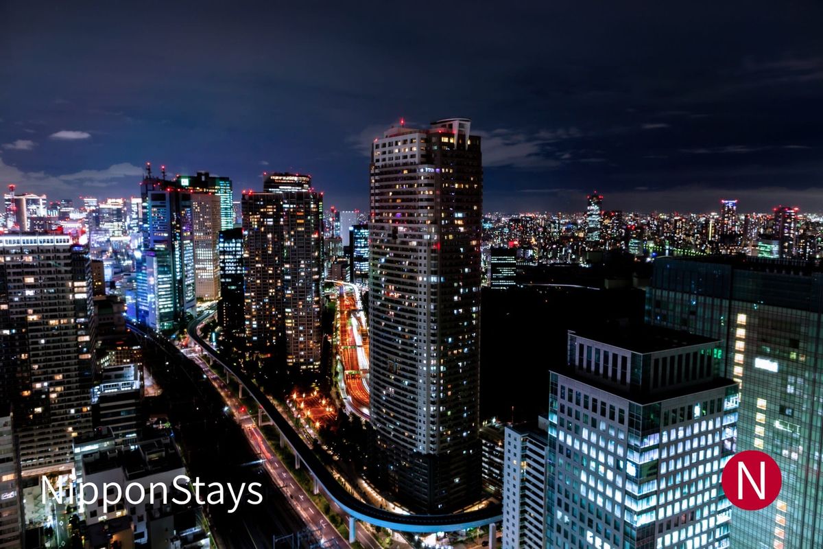 Tokyo's high-rise cityscape illuminated at night