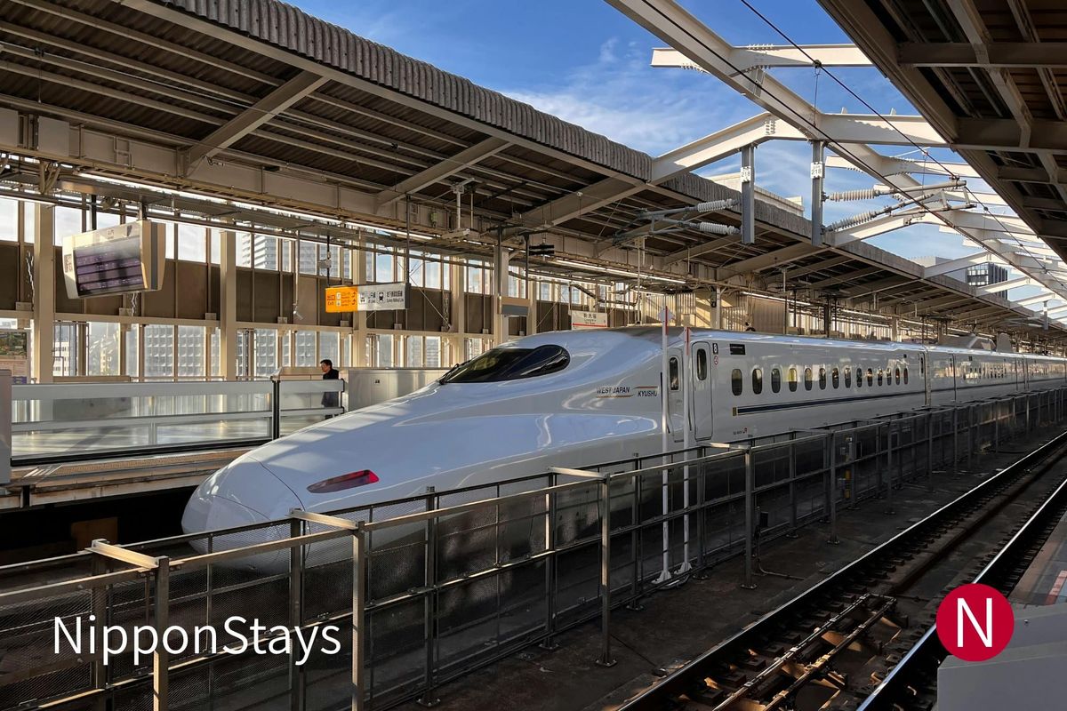N700 series shinkansen waiting at a platform at Shin-Osaka Station