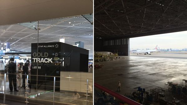 Star Alliance Gold Track entrance at Narita Terminal 1 beside a JAL jet at Haneda's maintenance hangar