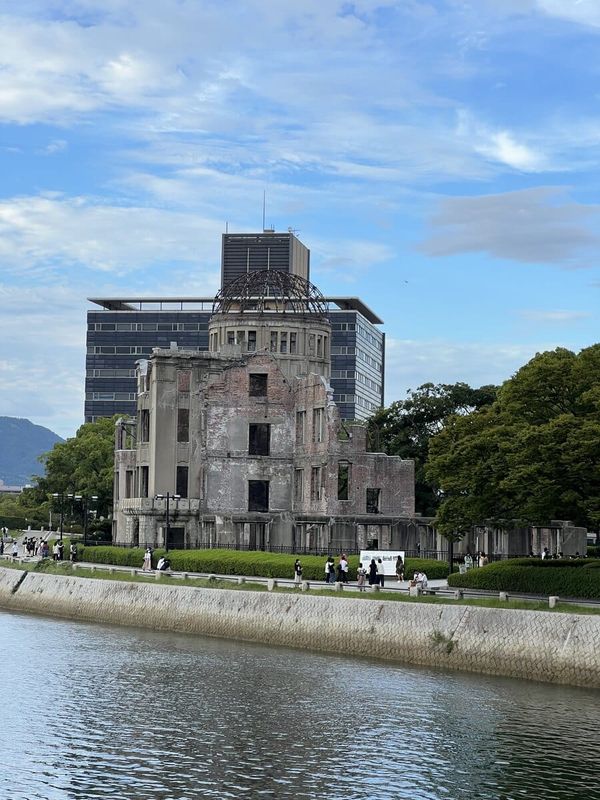 Atomic Bomb Dome and riverside lawn in Hiroshima