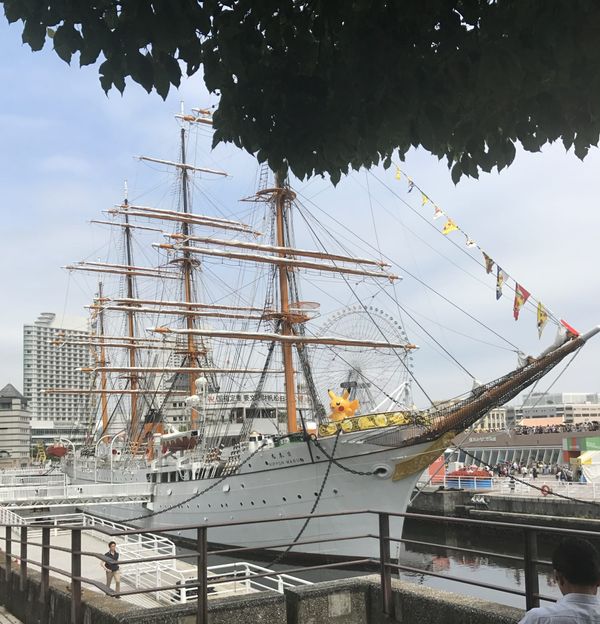 The sail training ship Nippon Maru and the Cosmo Clock 21 ferris wheel in Minato Mirai, Yokohama