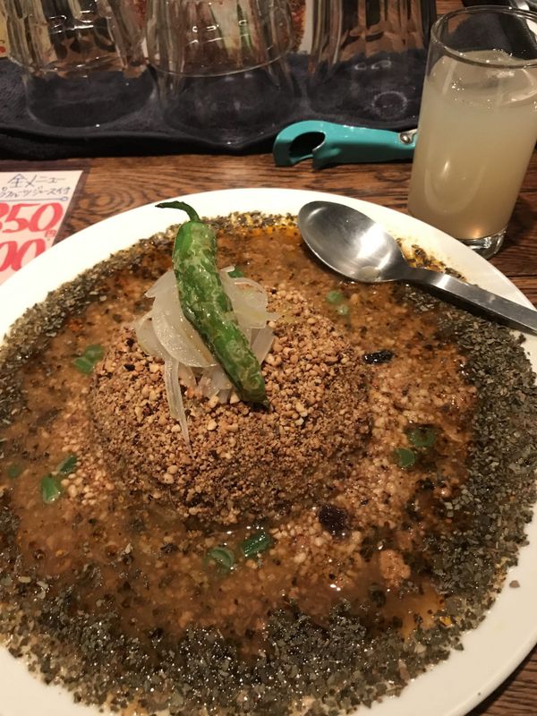 Japanese curry rice dish with green pepper at an Osaka restaurant near Dotonbori