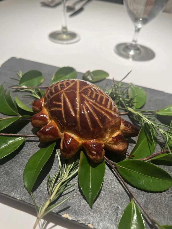 Otowa Restaurant's abalone baked in pastry, the crust scored like an abalone shell