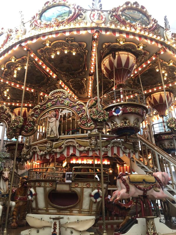 The ornate two-story indoor carousel at Rusutsu Resort, lit up