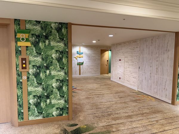 Corridor on the recreation floor of Sheraton Grande Tokyo Bay with a leaf-patterned wall