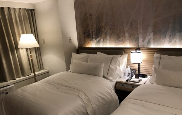 Twin beds in a room at the Westin Rusutsu Resort