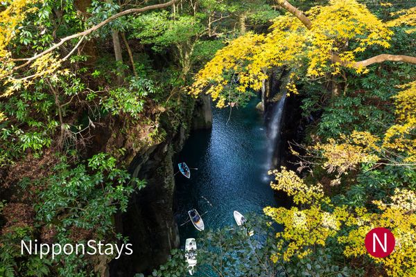 The cliffs and green water of Takachiho Gorge