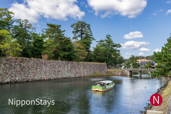 A boat on the moat that circles Matsue Castle
