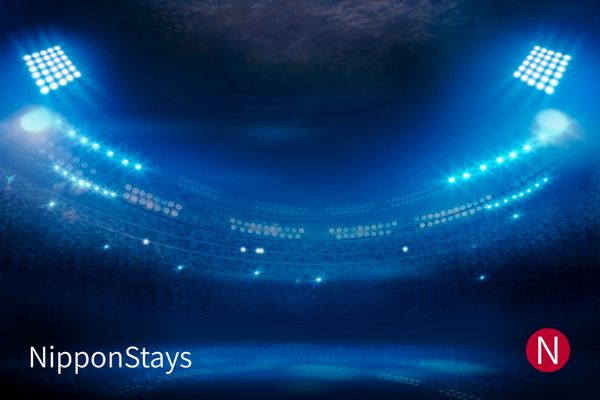 Stadium floodlights at night